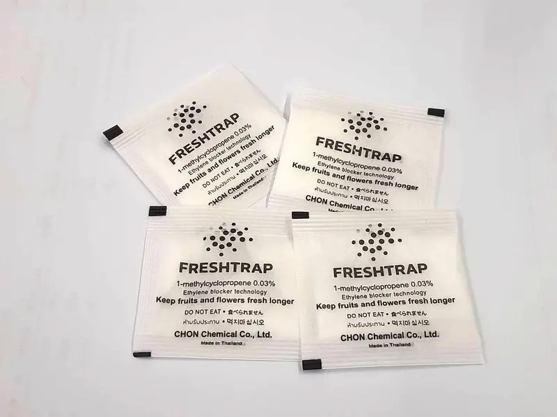 Four white FreshTrap 0.03% 1-MCP sachets printed with the FreshTrap mark.